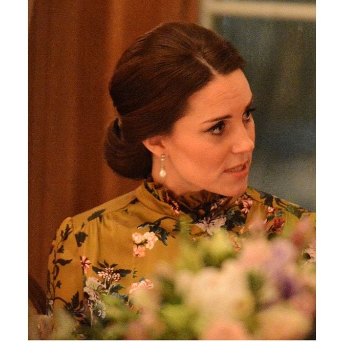 Duchess Kate wore her hair in a chignon, which helped show off her diamond and pearl earrings. The jewels once belonged to the royal's late mother-in-law, <a href="https://us.hellomagazine.com/tags/1/princess-diana/"><strong>Princess Diana</strong></a>.
Photo: WENN