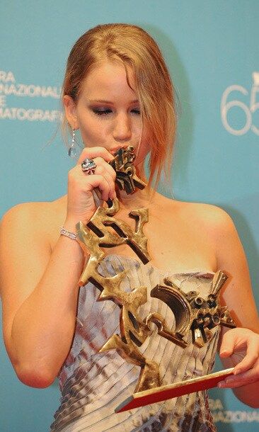 When an award is that beautiful, why wouldn't you give it a kiss? Jennifer planted a peck on her Marcello Mastroianni prize (given to emerging actors or actresses) at the Venice International Film Festival in 2008, where she won for her role in 'The Burning Plain.'
<br>
Photo: Getty Images