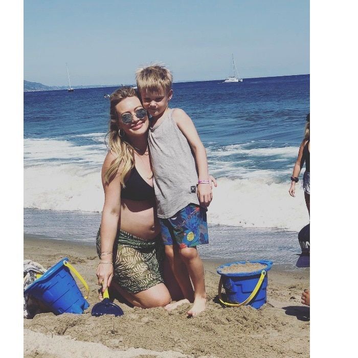 Hilary Duff had a fun beach day with her six-year-old son Luca. Flaunting her baby bump, the actress shared a cute snap of her and Luca posing to Instagram, writing: "My sweet sweet boy. Oh the adventures we've had." The pair seem to be enjoying their one-on-one time together before a new baby comes into the picture.
Photo: Instagram/@hilaryduff