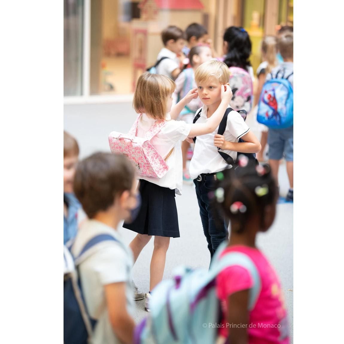 Princess Gabriella fixed her brother's hair on their first day back at school