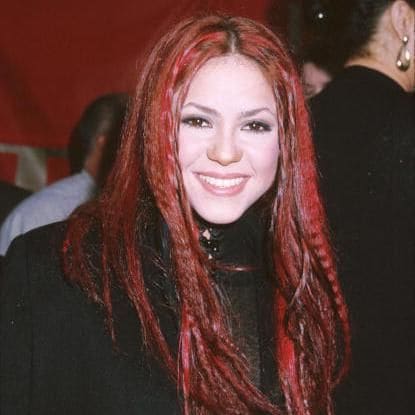 Shakira with red hair