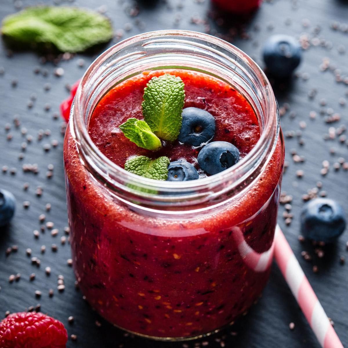 Fresh healthy smoothie made from blueberries, raspberries and chia seeds