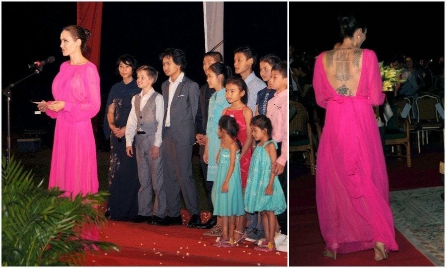 February 18: Angelina Jolie stunned in a hot pink chiffon gown at the premiere of her new film, <i>First They Killed My Father</i>. The full-length number showcased her famous back tattoos. The actress was joined by her children and Cambodian royalty at the Elephant Terrace inside the Angkor park in Siem Reap.
Photo: STR/AFP/Getty Images