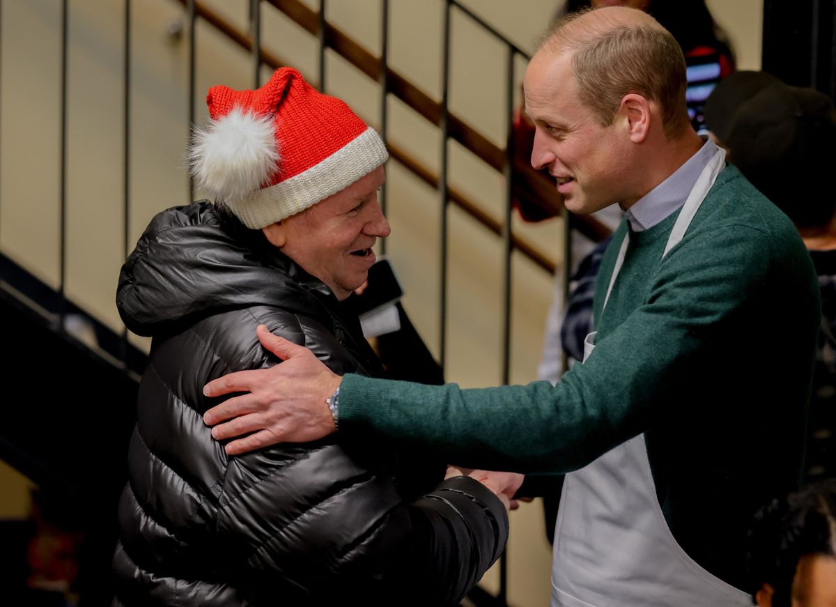 11/12/2023. London, UK. The Prince of Wales joins volunteers serving Christmas lunch at The Passage in central London.  Picture by Andrew Parsons / Kensington Palace