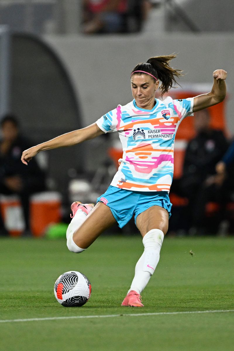 Alex Morgan, #13 of the Wave FC, shoots during a soccer match against the Club America Snapdragon Stadium on July 26, 2024, in San Diego, California. (Photo by Denis Poroy/Getty Images)