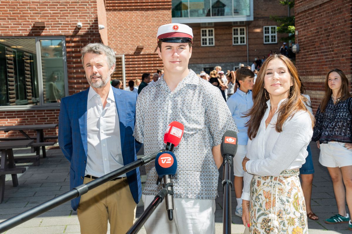 ORDRUP, DENMARK - JUNE 24: Crown Prince Christian, King Frederik X and Queen Mary meet the press as The Crown Prince Christian of Denmark attends his Graduation Ceremony at Ordrup Gymnasium on June 24, 2024 in Ordrup, Denmark. (Photo by Martin Sylvest Andersen/Getty Images)