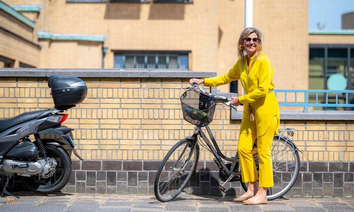 The Dutch royal looked sunny in a yellow outfit for the engagement