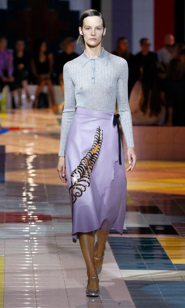 Lilac midi skirt with sky blue sweater from Prada