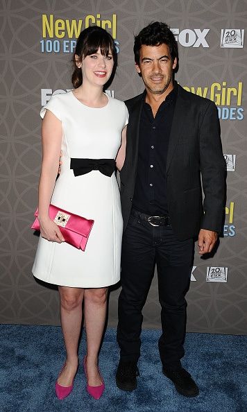 March 2: The New Parents! Zooey Deschanel and husband Jacob Pechenik posed during the 100th episode celebration of <i>New Girl</i>.
<br>
Earlier this week, Zooey opened up about her new baby girl and her silly noises saying, "She makes a lot of little like pterodactyl kind of noises. Like ahh, ooh, ahh. And a noise that sounds like choking. She'll be like ah, ah, ah. And I'll be like what's wrong and she'll be like ha, ha, ha!"
<br>
Photo: Getty Images