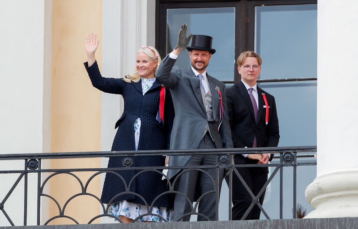 Members of the royal family of Norway (L-R) Crown Princess Mette-Marit of Norway, Crown Prince Haakon of Norway and Prince Sverre Magnus greet to the children's parade from the palace balcony during the Norwegian Constitution Day in Oslo, on May 17, 2023. (Photo by Frederik Ringnes / NTB / AFP) / Norway OUT (Photo by FREDERIK RINGNES/NTB/AFP via Getty Images)