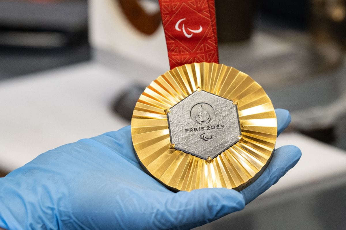This photograph shows a golden medal displayed in La Monnaie de Paris workshops, in Paris on June 25, 2024, ahead of the upcoming 2024 Paris Olympic and Paralympic Games.