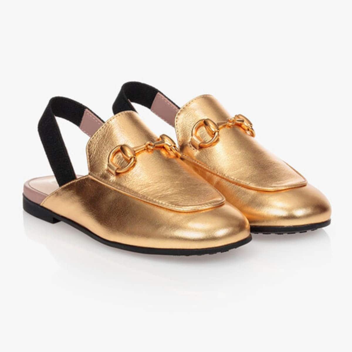 Gucci Princetown gold loafers slippers worn by Penelope Disick