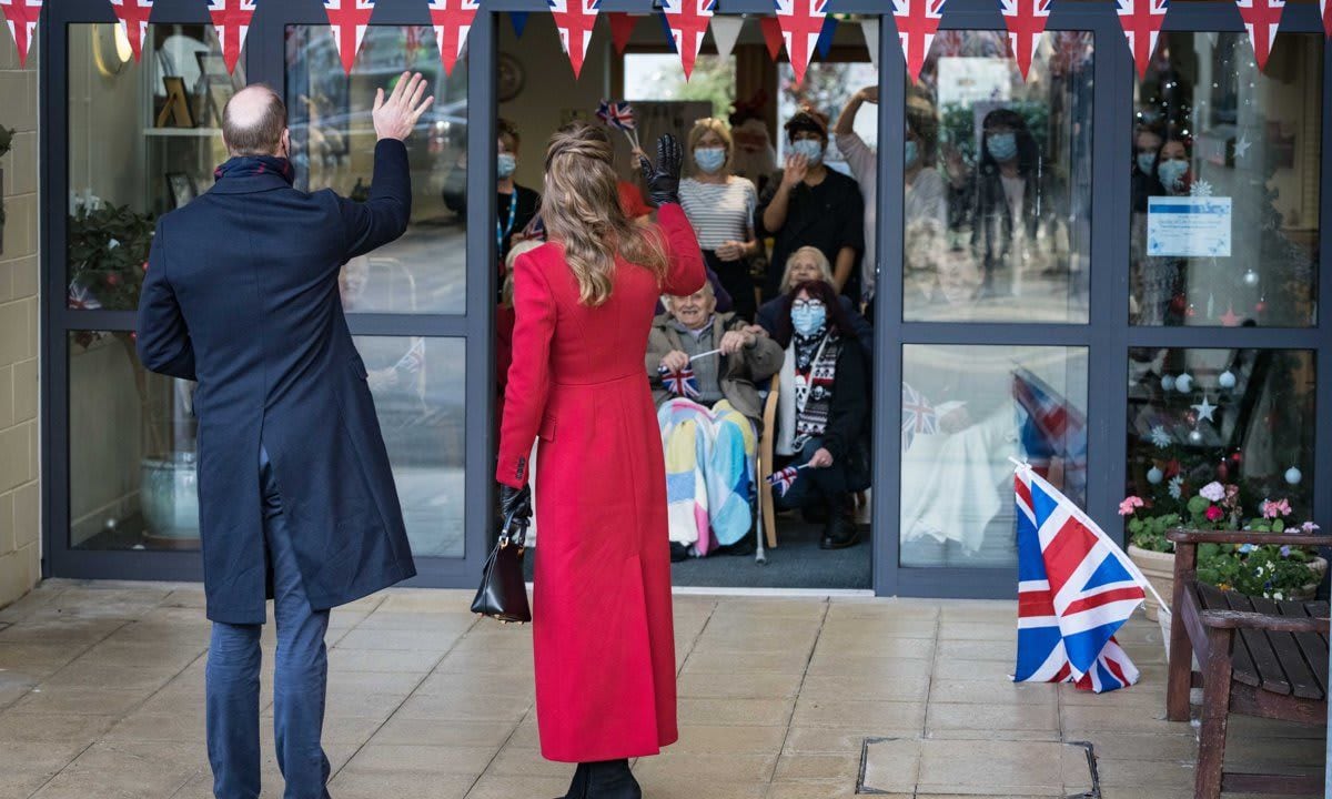 A socially distanced hello! The Duke and Duchess waved at residents of Cleeve Court Care Home.