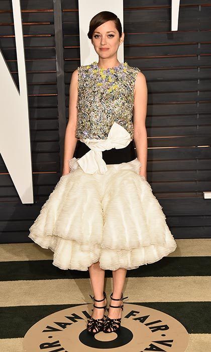 Surprising with a new designer in her wardrobe Marion attended the 2015 Vanity Fair Oscar Party in head to toe Giambattista Valli.
Photo: Pascal Le Segretain/Getty Images