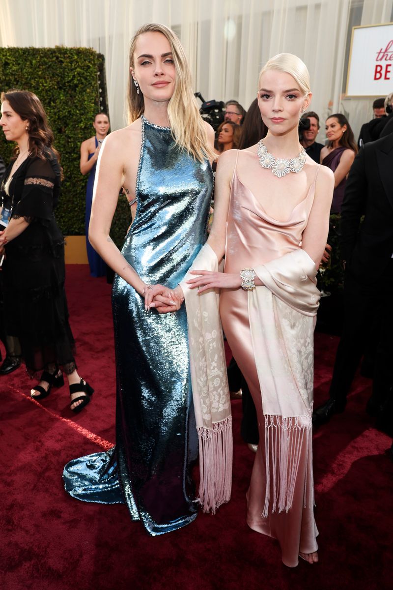 Cara Delevingne and Anya Taylor-Joy at the Golden Globes