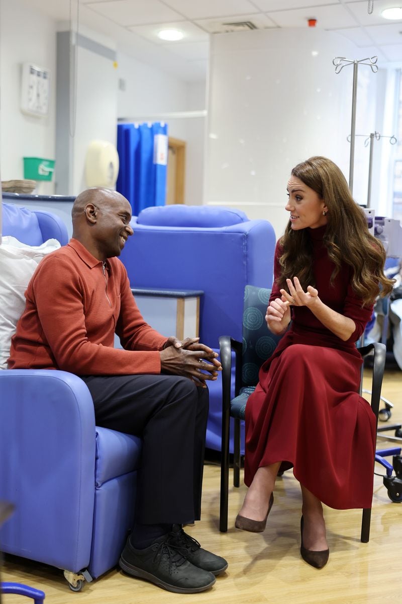 LONDON, ENGLAND - JANUARY 14: Catherine, Princess of Wales (R) talks with Peter Burton (L), during a visit to The Royal Marsden Hospital on January 14, 2025 in London, England. The Prince and Princess of Wales have today become Joint Patrons of The Royal Marsden NHS Foundation Trust following a visit by Her Royal Highness to the hospitalâs Chelsea site. The Princessâ own personal cancer journey saw her receive treatment from The Royal Marsden. The Royal Marsden opened its doors in 1851 as the worldâs first hospital dedicated to cancer diagnosis, treatment, research and education. (Photo by Chris Jackson/Getty Images)