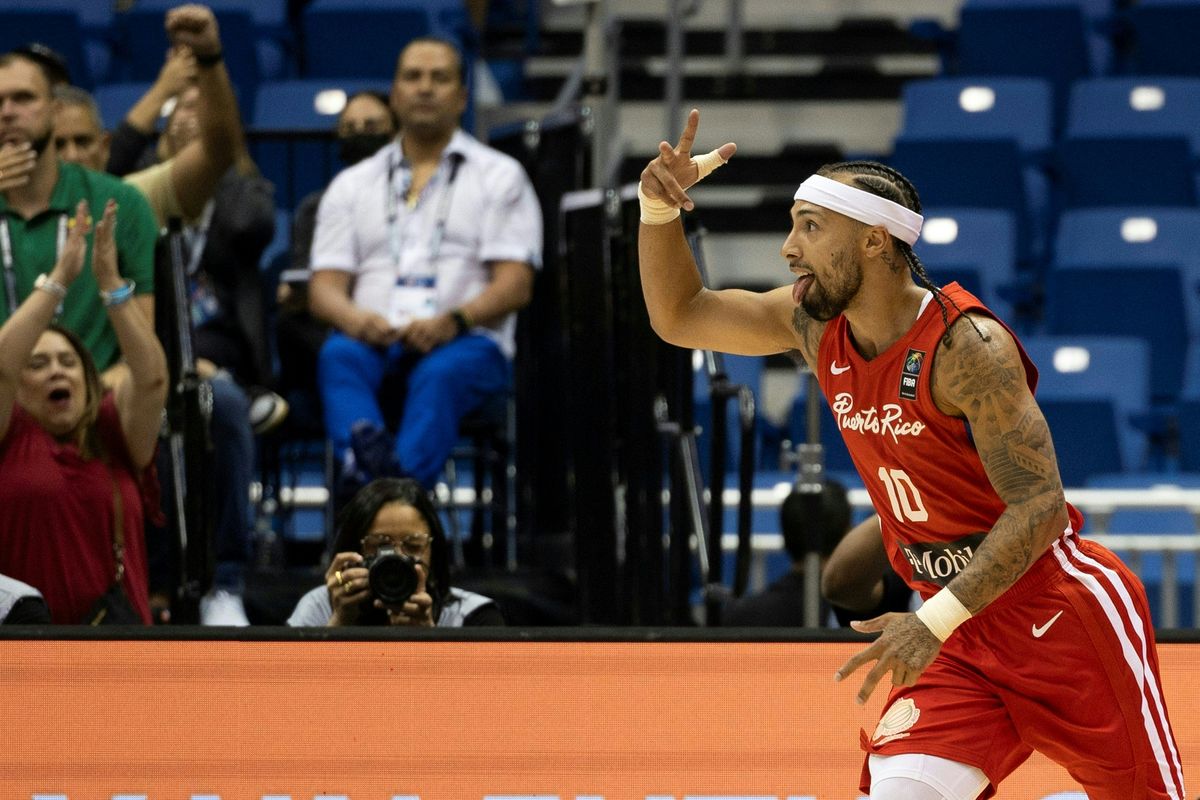 Puerto Rico's Jose Alvarado celebrates after scoring during the 2024 FIBA Men's Olympic Qualifying Tournament basketball match between Puerto Rico and Lithuania in San Juan, Puerto Rico, on July 7, 2024. 