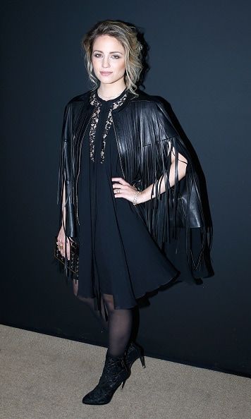 Dianna Agron stuck to black as she attended the Elie Saab fashion show.
<br>
Photo: Getty Images