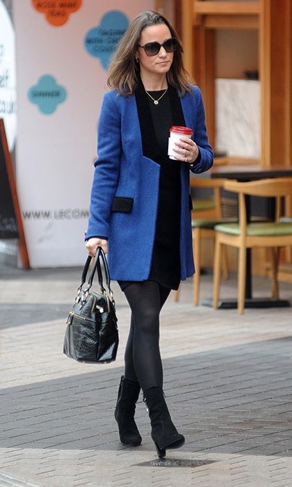 Out and about in London, Pippa paired a stylish blue coat with her signature black tights and boots.
<br>
Photo: Getty Images