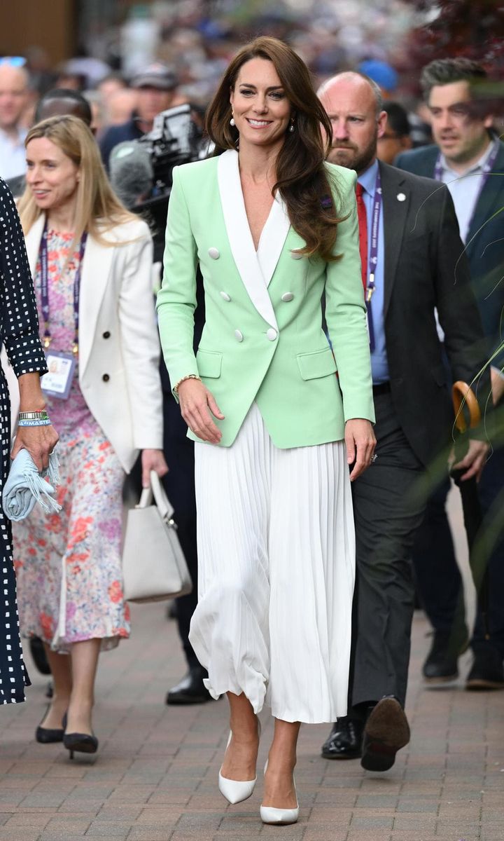 The Princess of Wales looked courtside chic wearing a mint green Balmain double breasted blazer to the tennis tournament on July 4.