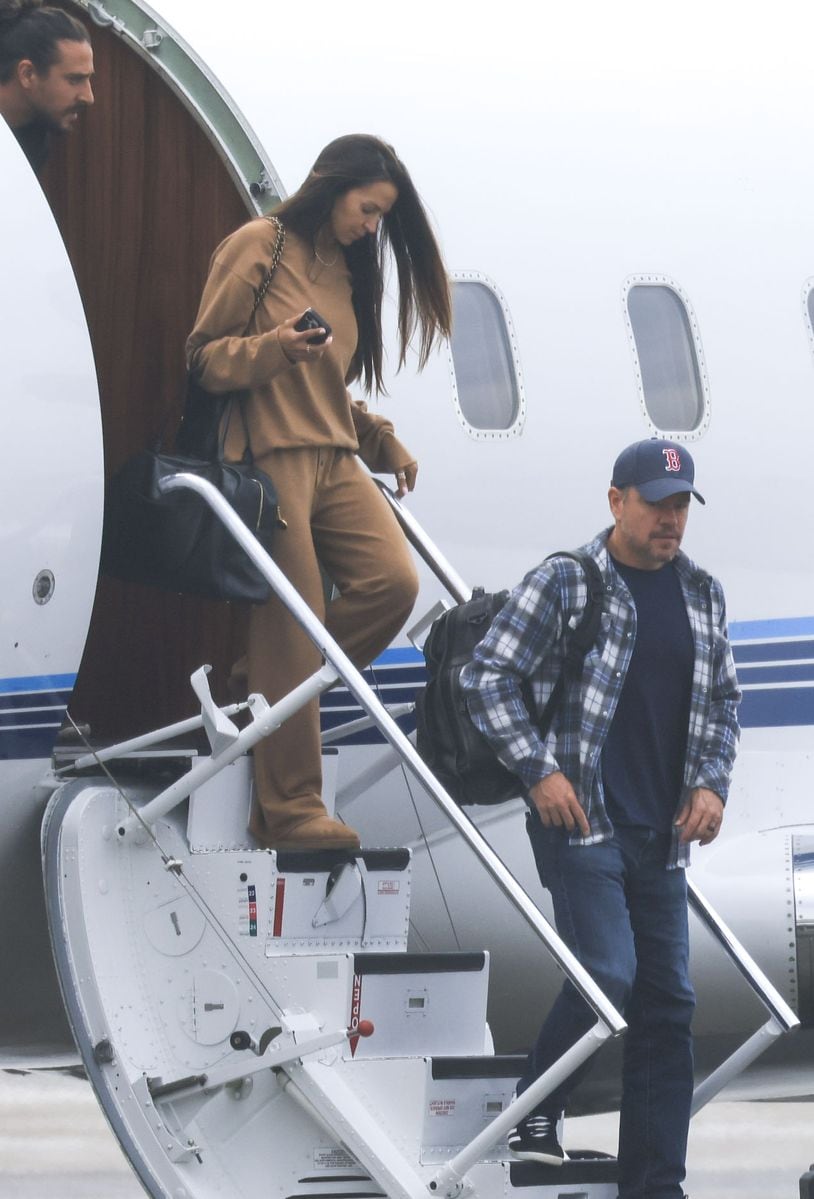 Matt Damon and wife Luciana exit the private plane