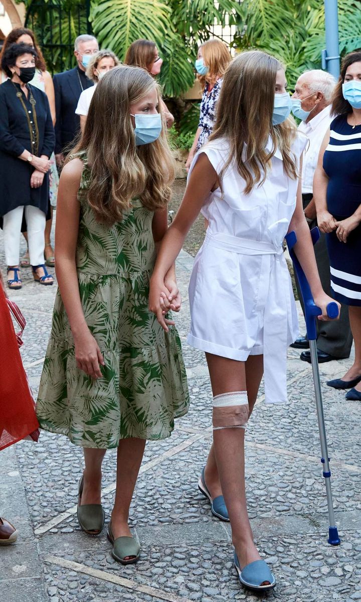 Leonor held on to her sister Sofia's hand while out in Petra on Aug. 10