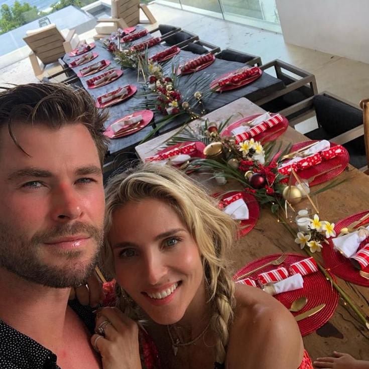 Chris Hemsworth and Elsa Pataky posing in their new home waiting for Christmas guests