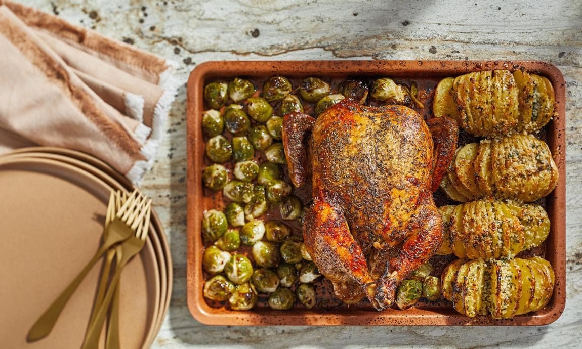 Roasted Whole Chicken with Hasselback Potatoes and Brussels for Thanksgiving issue story in Voraciously