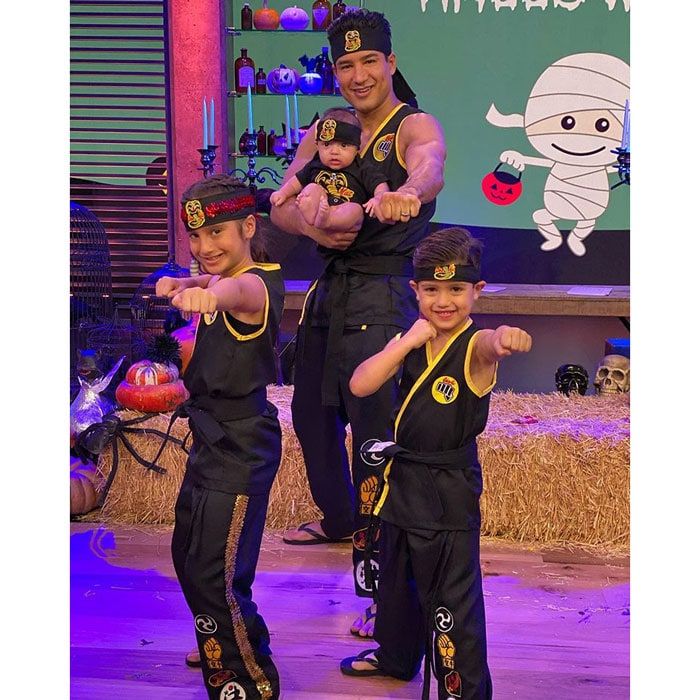 Mario Lopez and kids dressed as Karate Kid