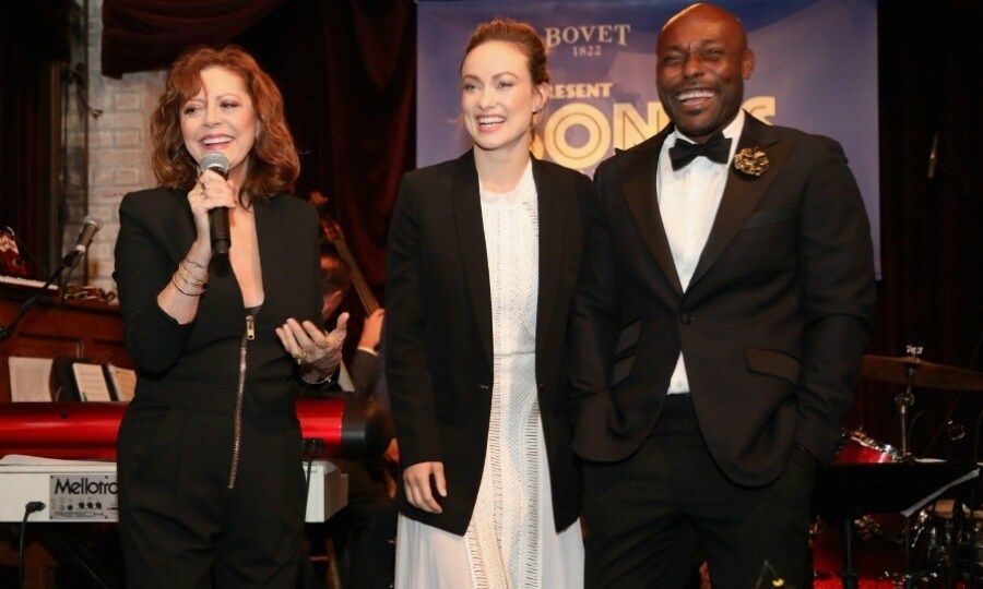 Susan Sarandon spoke onstage with Olivia Wilde and event co-host Jimmy-Jean Louis at BOVET 1822 & Artists for Peace and Justice present "Songs from the Cinema Benefit" on March 3 in L.A. The stars both serve as Board members for the foundation. The evening celebrated Oscars week while raising much-needed funds to support the tireless efforts of APJ, which brings education and training in creative industries to the youth of Haiti, while encouraging peace and social justice and addressing issues of poverty around the world.
"APJ gives Haitian kids the opportunity for higher education, and they will become the future leaders that Haiti needs," said Susan. "Thank you to Jackson Browne and all the artists who cleared their calendars for tonight."
Olivia added: "APJ started as a family and continues as a family. They are a group of people who have a really authentic connection to Haiti. I have great admiration for how the organization is run with a real eye on respect for local opportunities on the ground, and empowering people with the tools they need to do for their community what they so deserve. It has been life changing for me to be a part of this process. Haiti has been a part of my life since I was a kid. My parents took me there when I was three years old and I fell in live with it. The second I met everyone at APJ, I knew I had a home in Haiti. That's how I still feel today."
Photo: Jerritt Clark/Getty Images for Artists for Peace and Justice