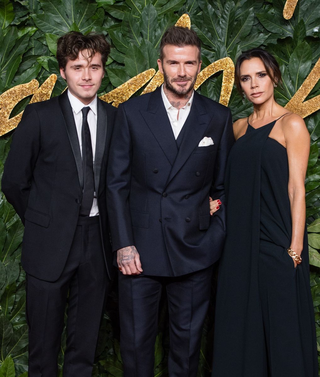 Brooklyn Beckham, David Beckham and Victoria Beckham arrive at The Fashion Awards 