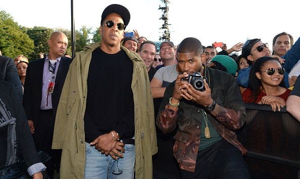 Jay Z and a newly married Usher spent some time in the audience taking pictures with some lucky fans.
<br>
Photo: Getty Images