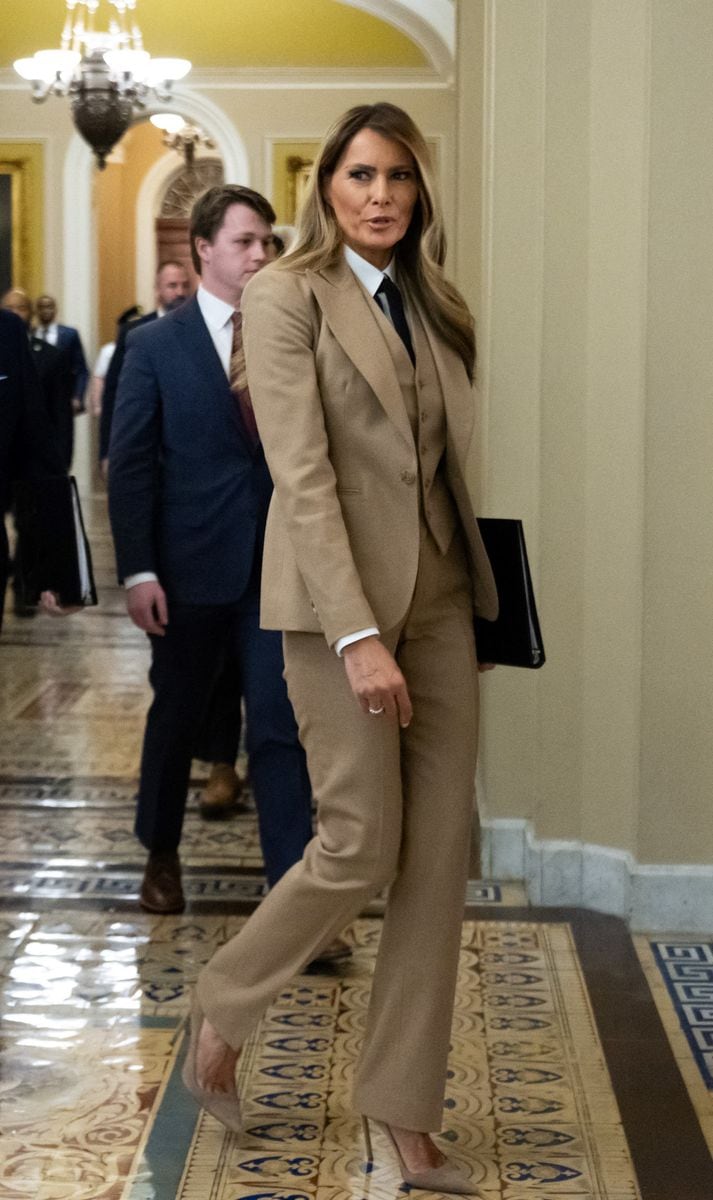 Melania Trump walks to a meeting to urge passage of the Take It Down Act 