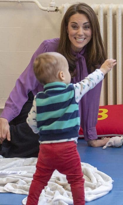 Kate Middleton laughing at little boy