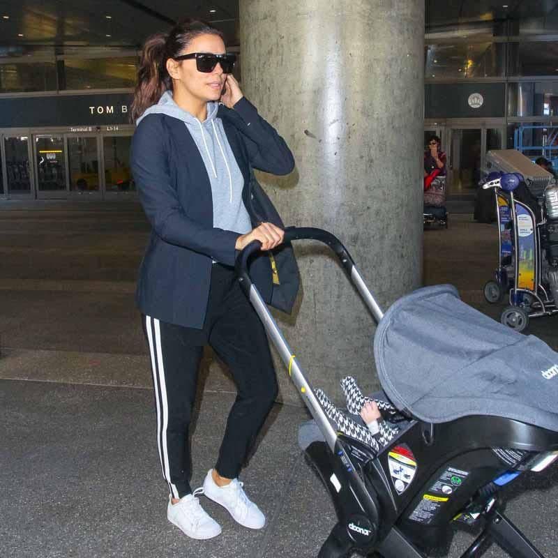 Eva Longoria with baby Santiago at the airport