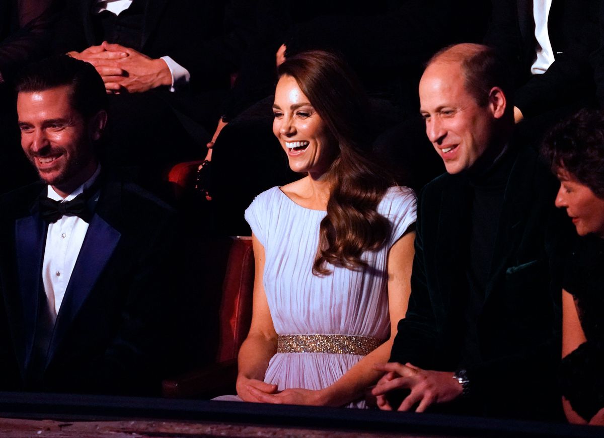 Britain's Prince William, Duke of Cambridge, (R) and Britain's Catherine, Duchess of Cambridge, (C) smile as they attend the inaugural Earthshot Prize awards ceremony at Alexandra Palace in London on October 17, 2021. The Earthshot Prize honours five inaugural winners with an award of  Â£1 million ($1.4 million, 1.2 million euros) each to pursue solutions to the world's greatest environmental problems at a glitering gala ceremony. Prince William, Duke of Cambridge, launched the prestigious Earthshot Prize in October 2020 and hopes that the event will help propel the fight against climate change leading up to the COP26 summit in Scotland, calling those on the shortlist "innovators, leaders and visionaries". (Photo by Alberto Pezzali / POOL / AFP) / Embargoed until 2000 GMT (Photo by ALBERTO PEZZALI/POOL/AFP via Getty Images)