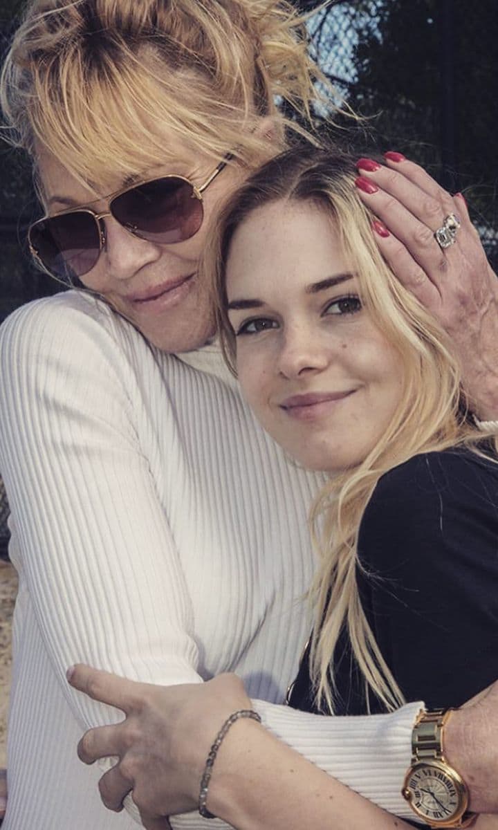 Melanie Griffith and Antonio Banderas daughter Stella posing with mom