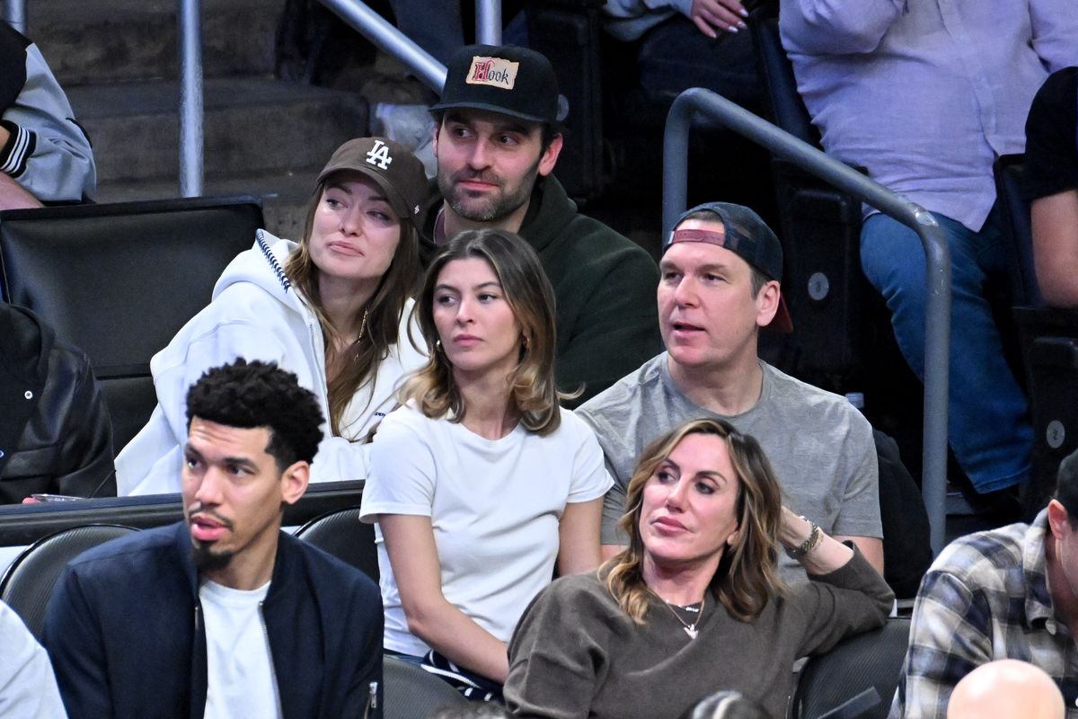 Olivia Wilde and Dane Diliegro sit behind Kelsi Taylor and Dane Cook