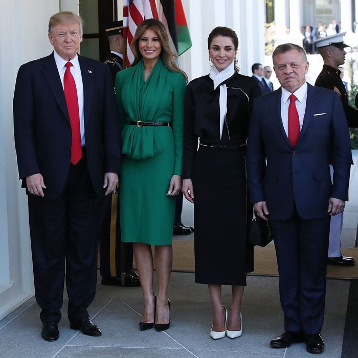 Melania looked gorgeous in green to welcome Queen Raina and King Abdullah II of Jordan to the White House in April 2017. The stylish first lady wore a belted draped dress for her first meeting with a royal figure since her husband's inauguration. President Trump's wife completed her polished look with black pumps and her signature blowout.
Photo: Getty Images