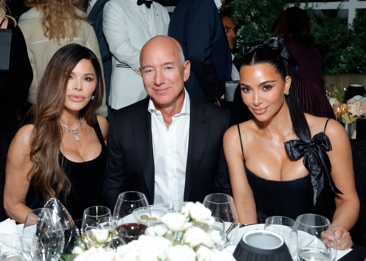 Lauren Sanchez, Jeff Bezos, and Kim Kardashian attend the CHANEL and Charles Finch Annual Pre-Oscar Dinner 