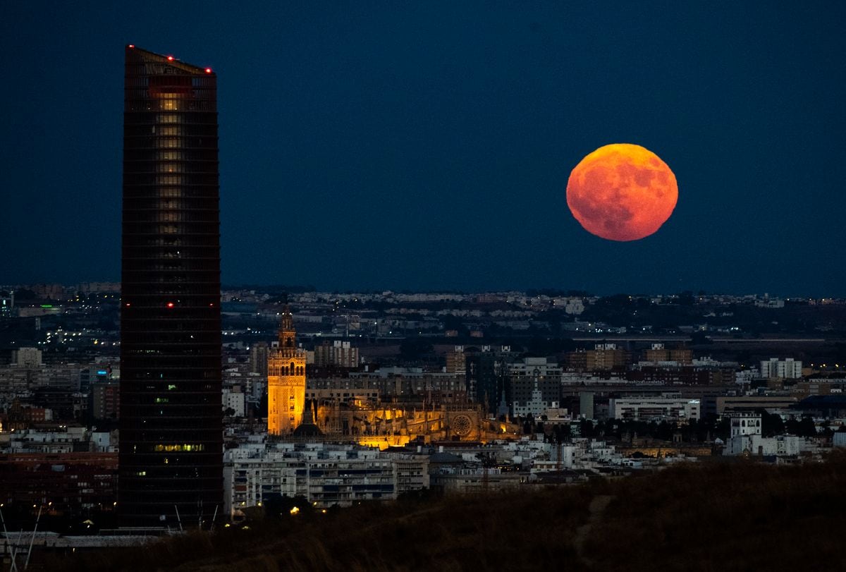 Full Moon rises over Seville, Spain.