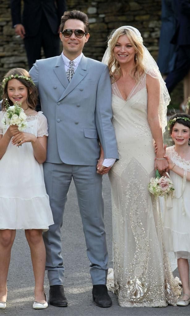 Kate Moss with Jamie Hince wearing a John Galliano dress