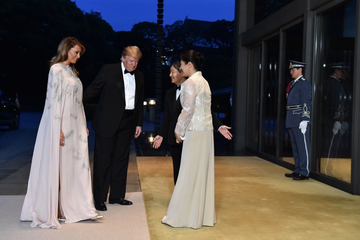 President Donald Trump and First Lady Melania Trump are greeted by Japan's Emperor Naruhito and Empress Masako upon their arrival at the Imperial Palace 