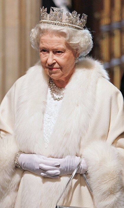 Nothing beats Queen Elizabeth's major tiara moments here the elegant monarch donned the Diamond Diadem made by Rundell, Bridge & Rundell for the State Opening of Parliament at the House of Lords on November 6, 2007 in London.
A diamond bracelet, silver bag and white gloves completed the look.
Photo: Tim Graham/Getty Images