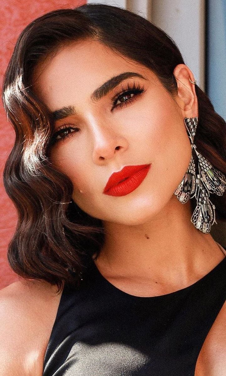 Alejandra Espinoza with a red-lipped beauty look