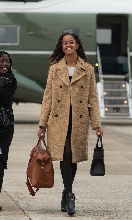 January 2017: Malia kept it casual in earth tones as she boarded Air Force One at Andrews Air Force Base to depart for Chicago for her father's farewell address.
Photo: NICHOLAS KAMM/AFP/Getty Images