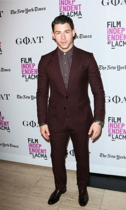 September 20: Nick Jonas looked dapper and handsome in a burgundy suit for the screening of his new film <i>Goat</i> in L.A.
Photo: Paul Archuleta/FilmMagic)