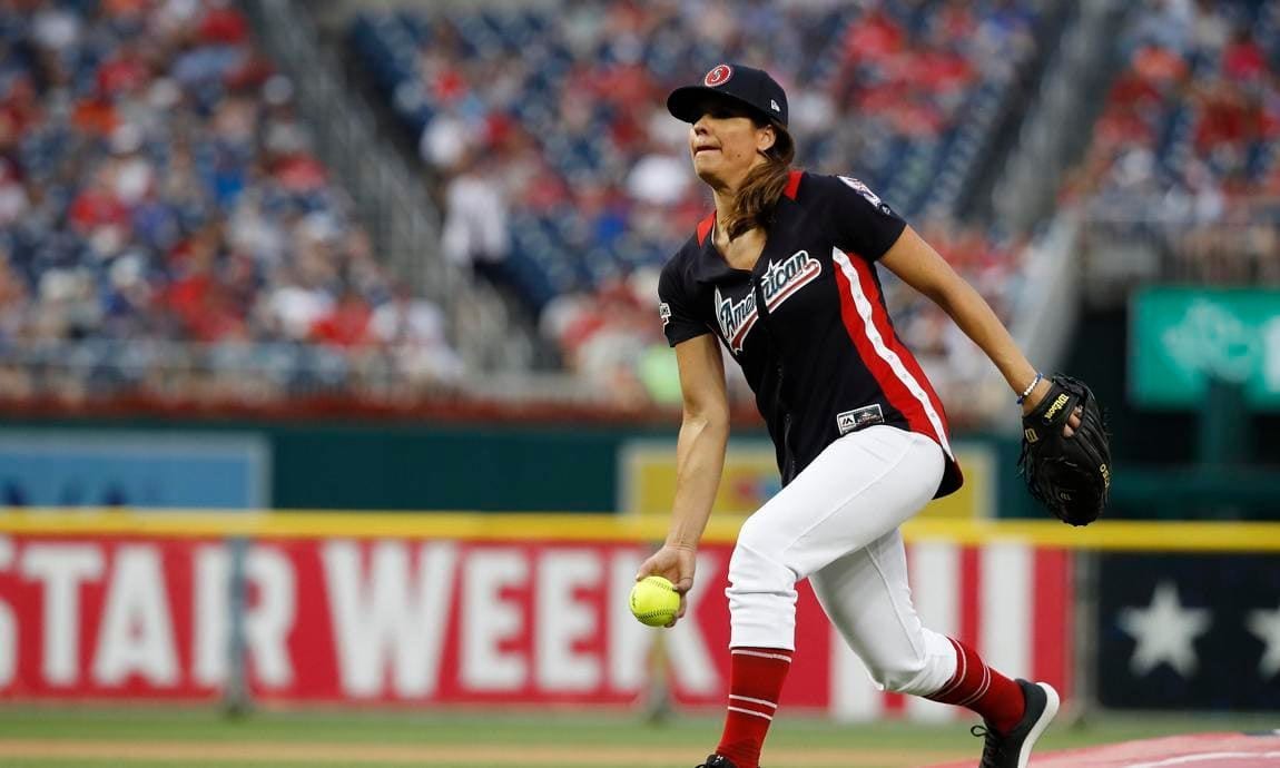 Jessica Mendoza pitches during a 2018 All Star and Legends Celebrity Softball Game at Nationals Park