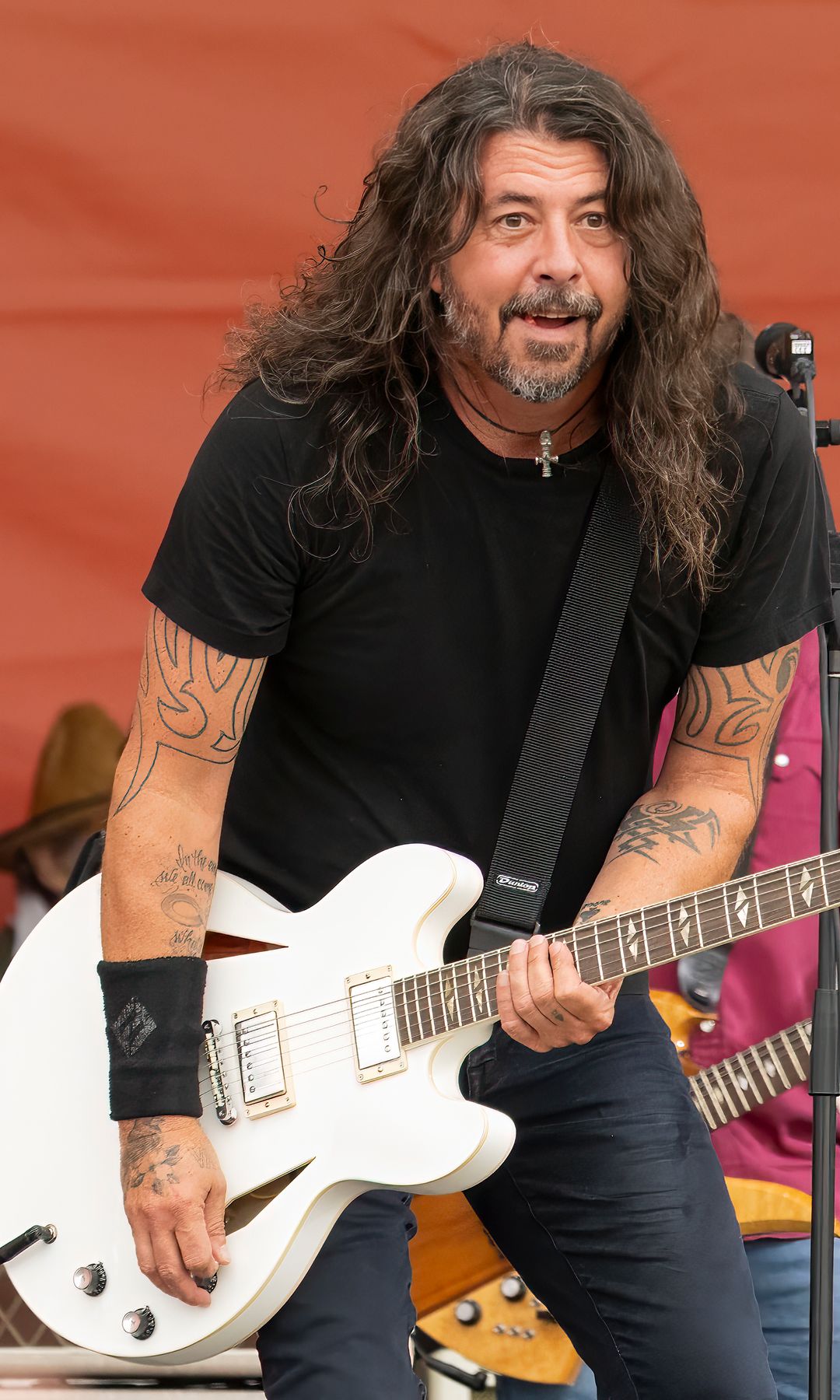 Dave Grohl performs with Foo Fighters on Day 6 on April 28, 2024, without a ring 