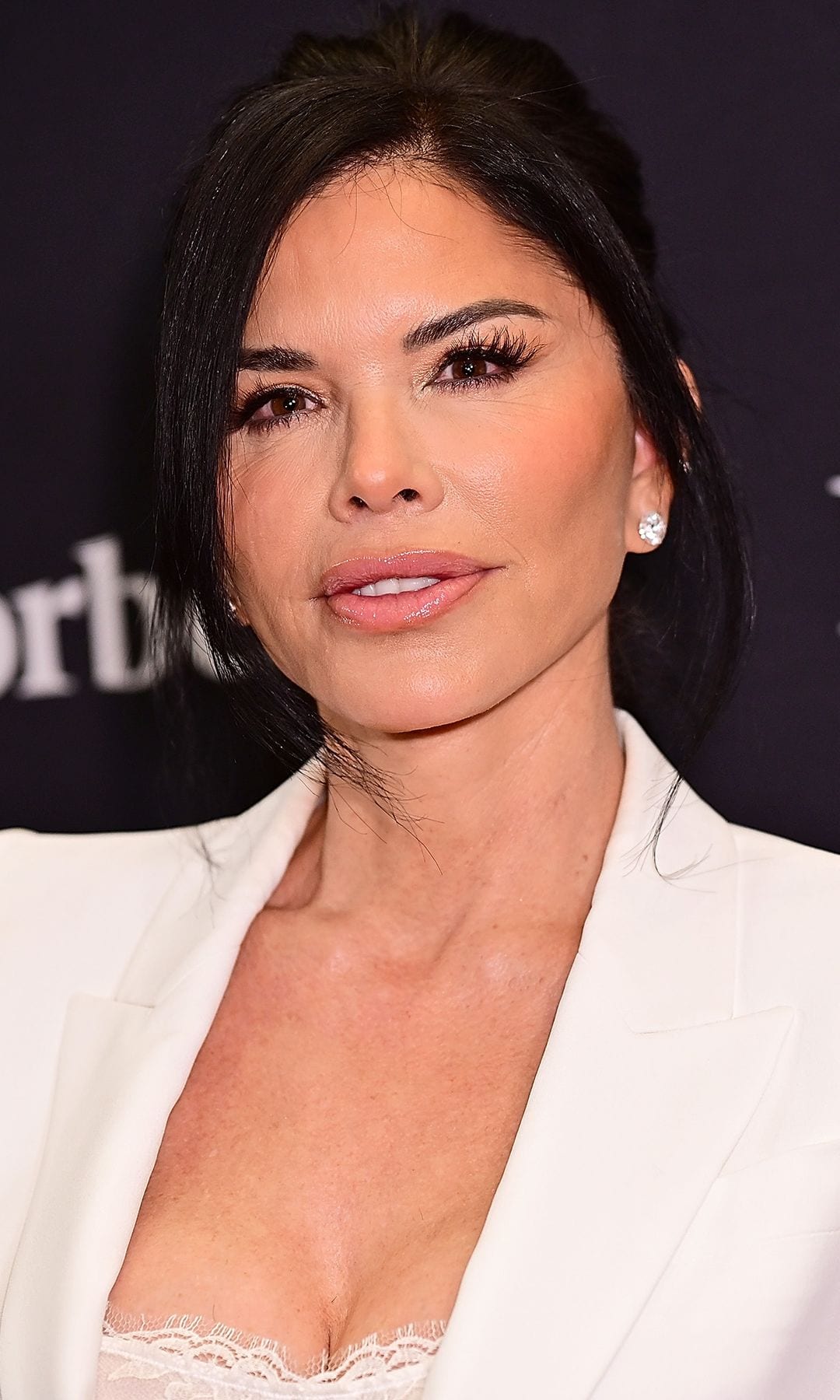 Lauren Sanchez turns heads in lace corset while responding to criticism over her outfits